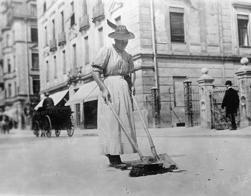 Women worker in Germany, street sweeper ca. between 1909 and 1920