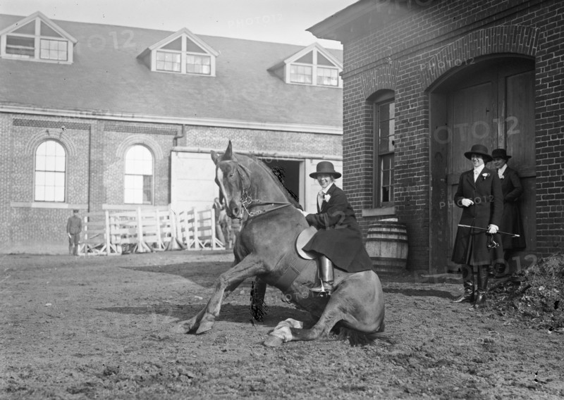 Helen Buchanan atop a sitting horse ca. between 1909 and 1919
