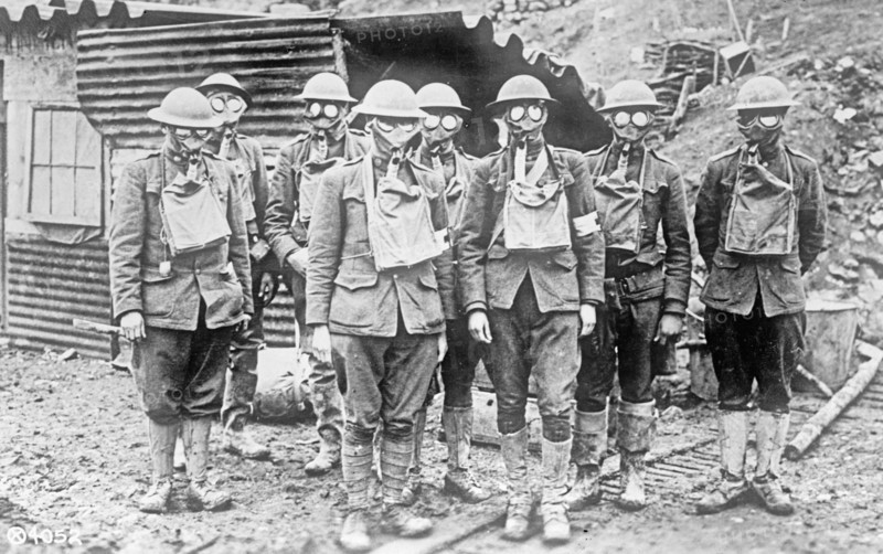 Soldiers wearing gas masks ca. between 1909 and 1920