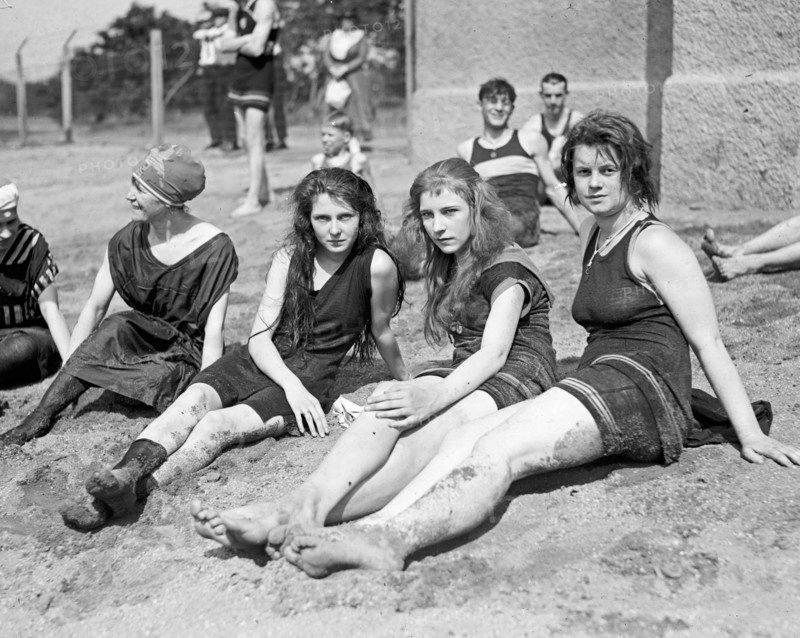 Young women or teen girls in swim suits on a bathing beach ca. between 1909 and 1932