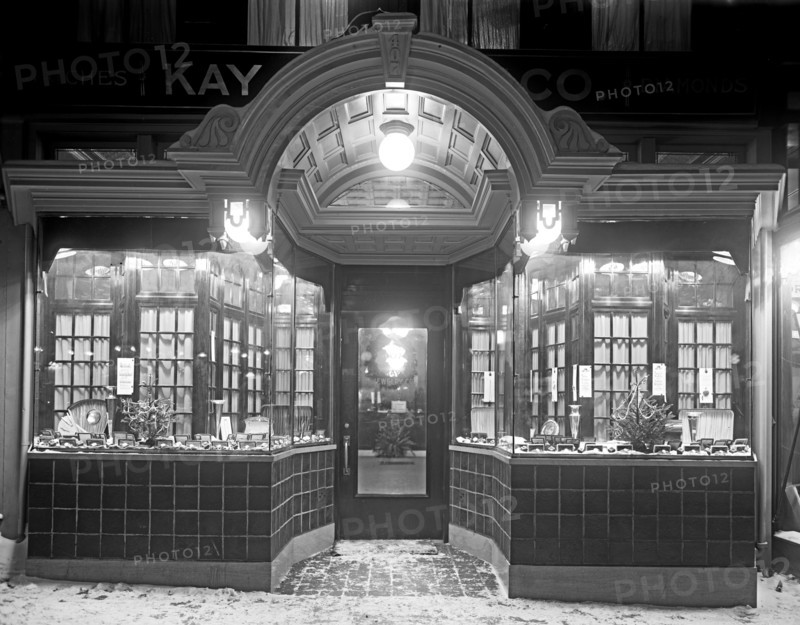 Kay Jewelry Company front windows  at night ca. between 1909 and 1940