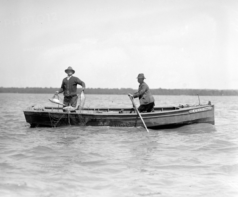 Two men in a boat shad fishing on the Potomac ca. between 1909 and 1932