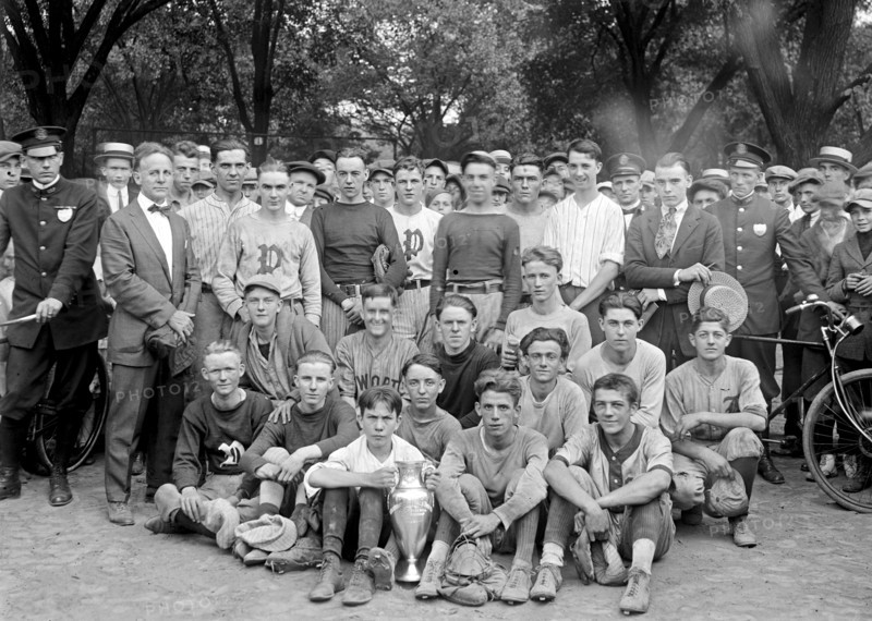 Sports team group photo with trophy ca.  between 1918 and 1921