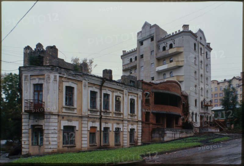 Shabarova house (Frunze Street, around 1900), with 1990s apartment building in background, Khabarovsk, Russia; 2000