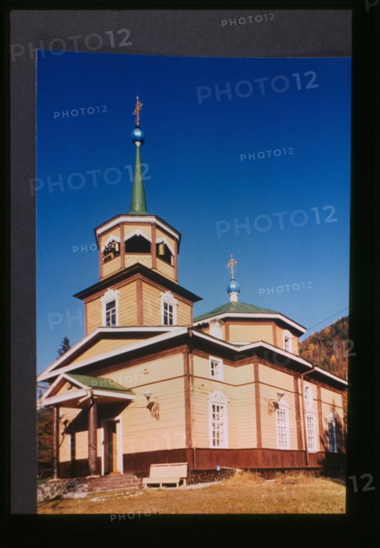 Log Church of Saint Nicholas (1846), southwest view which was originally built near the site where Lake Baikal drains into the Angara River, Listvianka, Russia; 1999