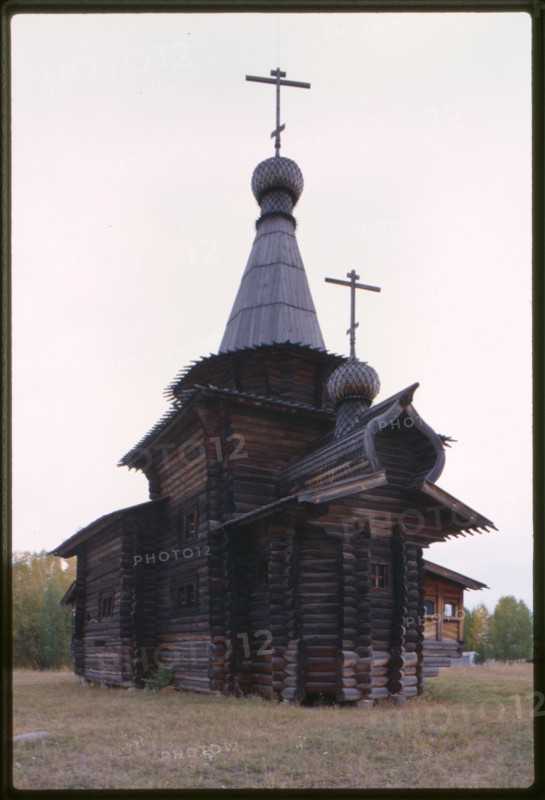 Log Church of the Savior from the village of Zashiversk (1700), southeast view, moved and reassembled in the Outdoor Architecture and History Museum at Akademgorodok, Russia; 1999