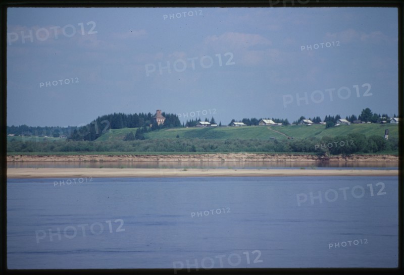 Brick Church of Trinity (18th century), southwest view taken from Dvina River on sidewheeler, Troitsa, Russia 1999.