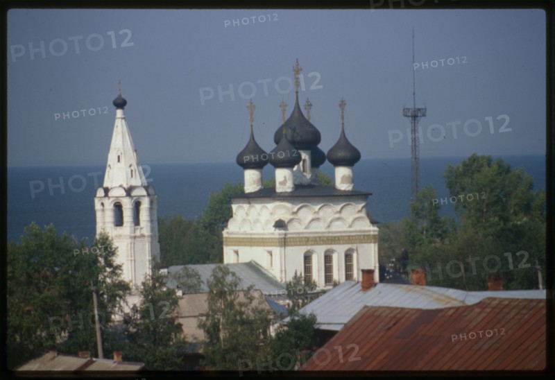 Summer panorama, with Church of the Merciful Savior (1716-23), and Beloe Ozero (White Lake) in background, Belozersk, Russia; 1999