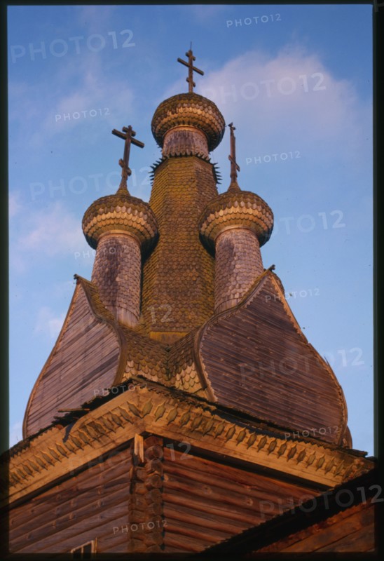 Church of the Hodigitria Icon of the Virgin (1763), northwest view, wooden domes, Kimzha, Russia; 2000