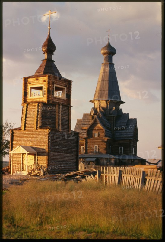 Bell tower (2001), with Church of Dormition (1674), Varzuga, Russia; 2001