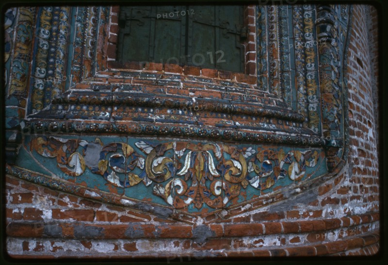 Church of Saint John Chrysostome in Korovniki (1649-54), east facade, detail of decorative ceramic window surround, Yaroslavl', Russia; 1987