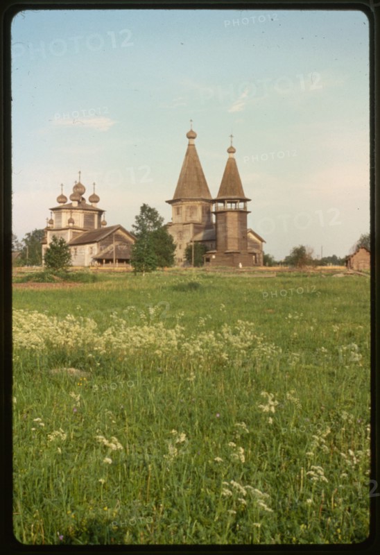 Pogost (churches and cemetery) (18th-19th centuries), northwest view, Liadney, Russia 1998.