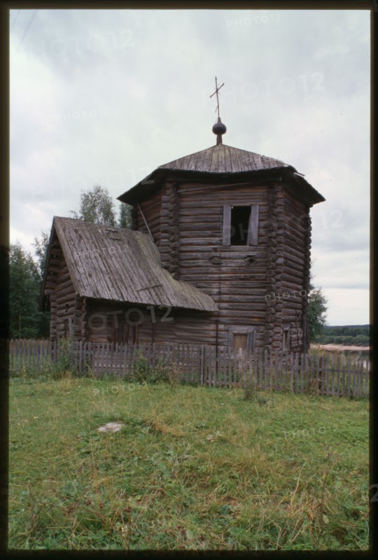 Log Church of the Epiphany (also known as Nativity of the Virgin, oldest wooden structure in the Urals, 1617), southwest view, Pianteg, Russia; 2000