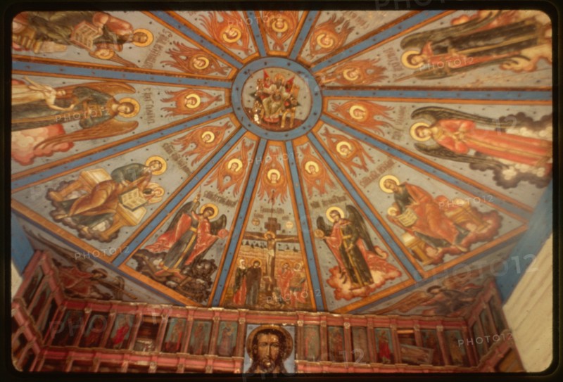 Church of the Intercession (1743, 1761), interior, view east with upper tier of icon screen and nebo (sky, or painted ceiling), Liadiny, Russia 1998.