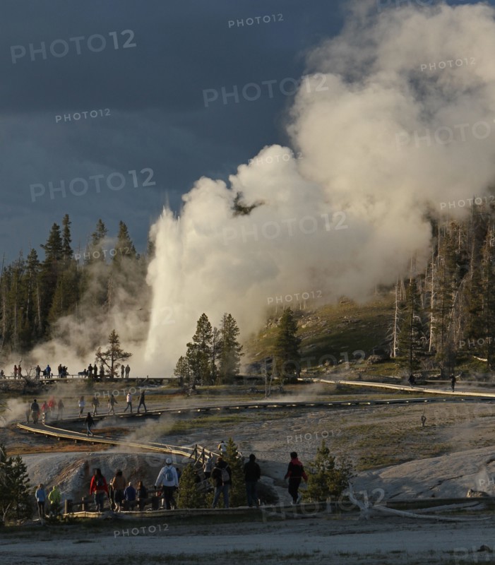 Grand Geyser and visitors on boardwalk in Upper Geyser Basin in Yellowstone National Park; Date: 19 June 2012