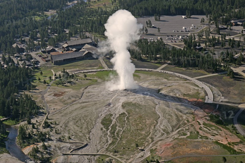 Aerial view of Old Faithful Geyser and Old Faithful Lodge in Yellowstone National Park; Date: 22 June 2006