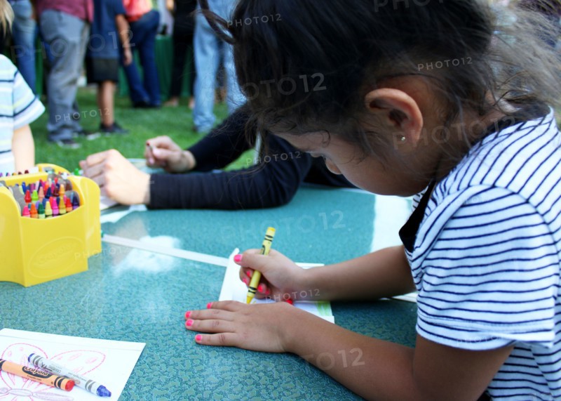 Ojai, Calif. (March 18, 2017) - Visitors color seed packets to hold native pollinator seeds during an event at the Libbey Bowl celebrating women in science