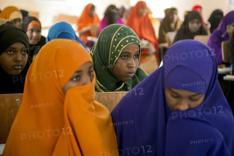 Young Muslim women listen during a teacher training session in Mogadishu or Garowe via the Somali Youth Learners Initiative (SYLI) ca. 16 June 2015
