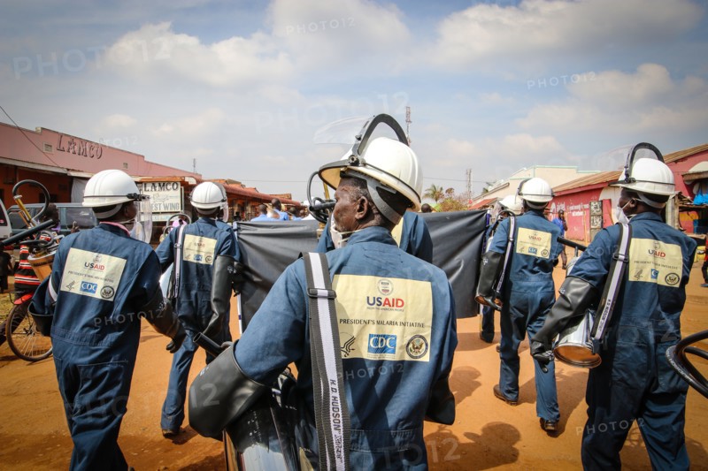 USAID workers participate in Indoor Residual Spraying activities which have protected almost 7 million Ugandans from malaria, and contributed to reducing malaria infection rates in targeted districts by 55 percent ca. 3 January 2016