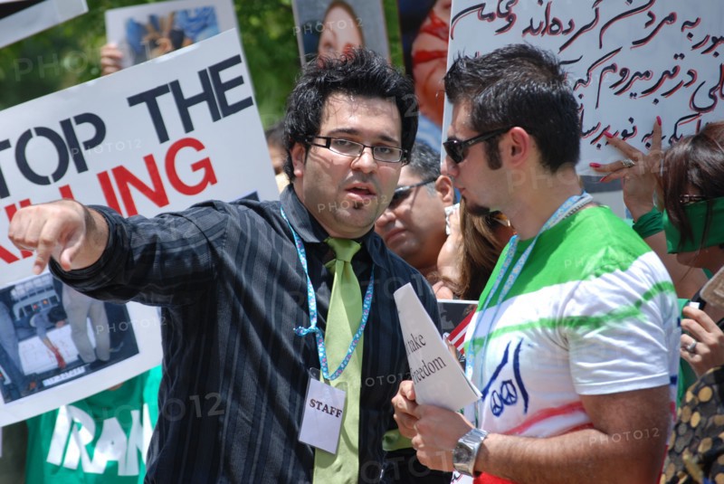 Iranians in Texas taking part in a Freedom for Iran / Green Revolution rally at Dallas City Hall plaza in downtown Dallas, TX ca. June 2009
