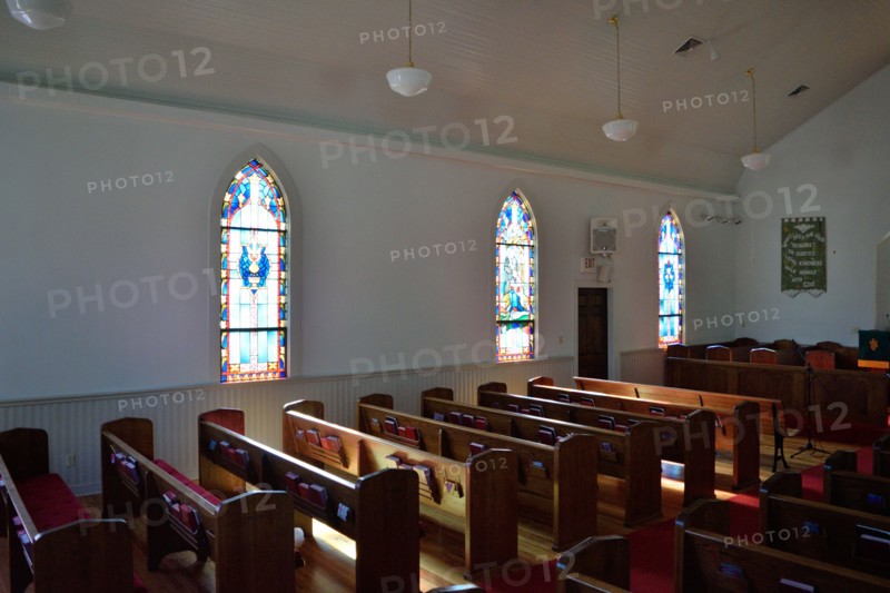 Interior of the United Methodist Church in Utopia, TX; empty church pews