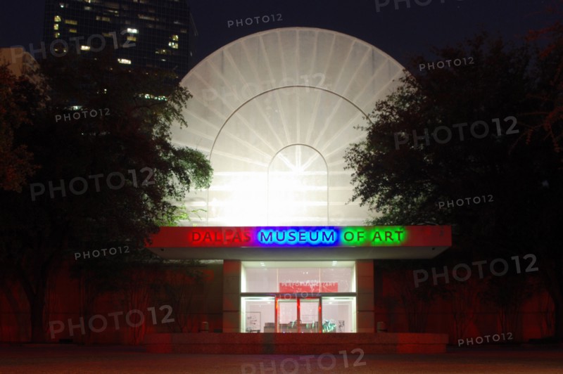 Night photo of the Dallas Museum of Art side entrance in Dallas, TX