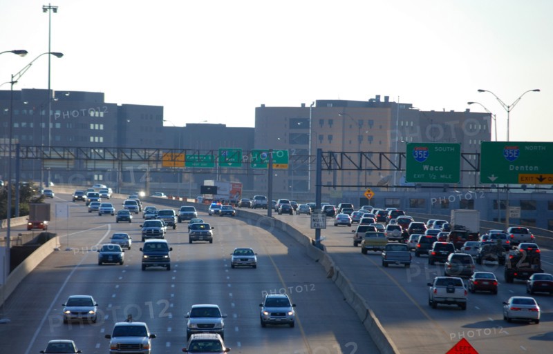 Busy late afternoon highway traffic in downtown Dallas, TX