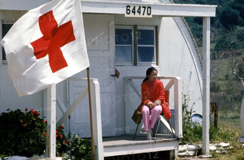 A woman waits for medical treatment