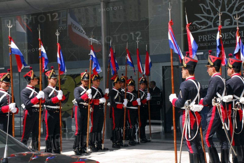 Blandengues Corps await the arrival of Hillary Clinton