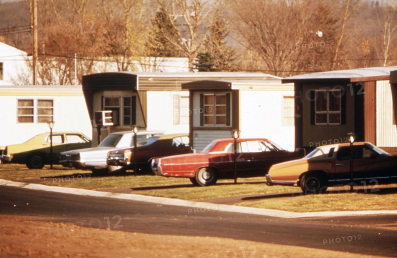 Cars parked in front of mobile Homes