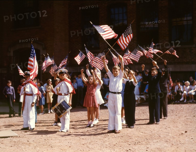 Children stage a patriotic demonstration