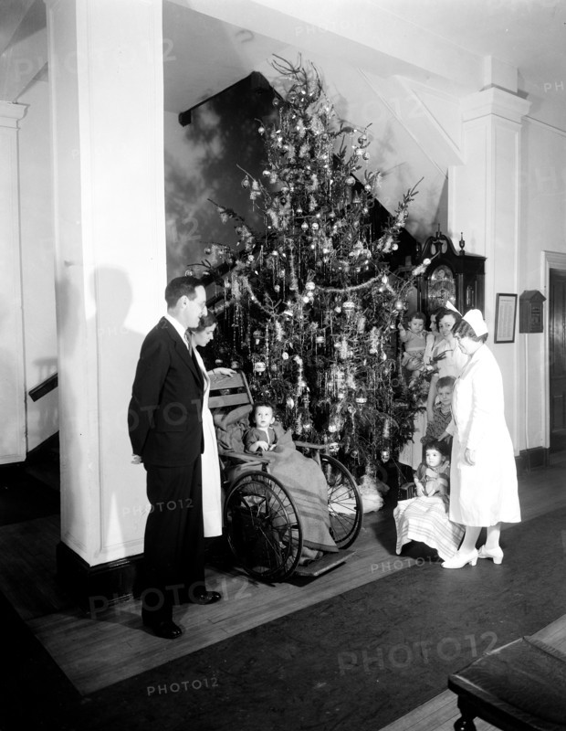 Christmas tree with children in wheelchairs