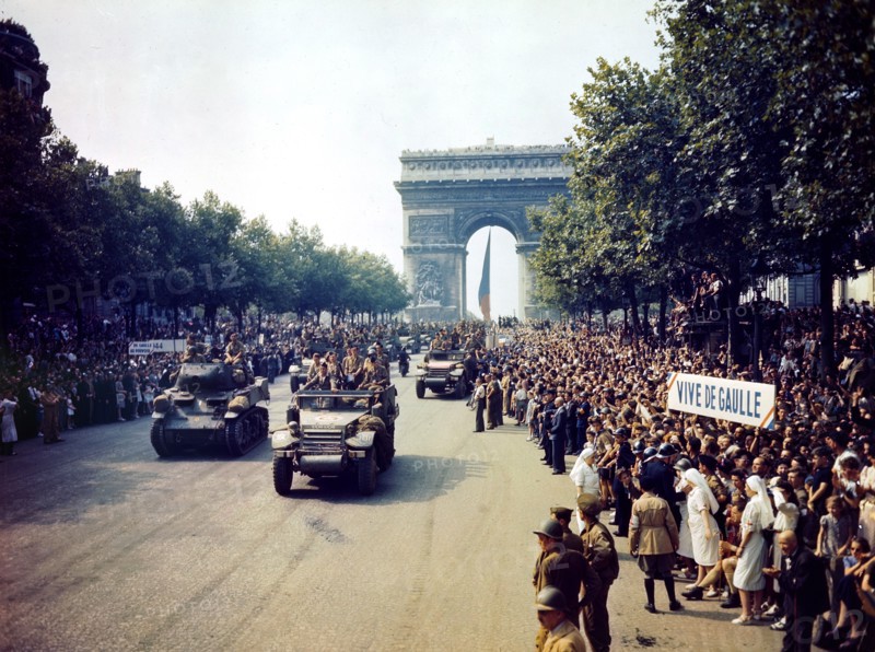 Crowds of French patriots line the Champs Elysees