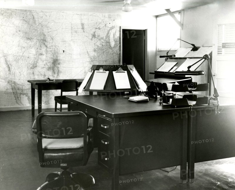 Forecast Desk With World Map on Wall Scottsbluff