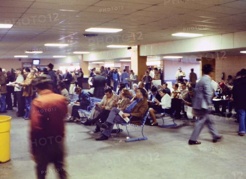 Horse race fans placing bets