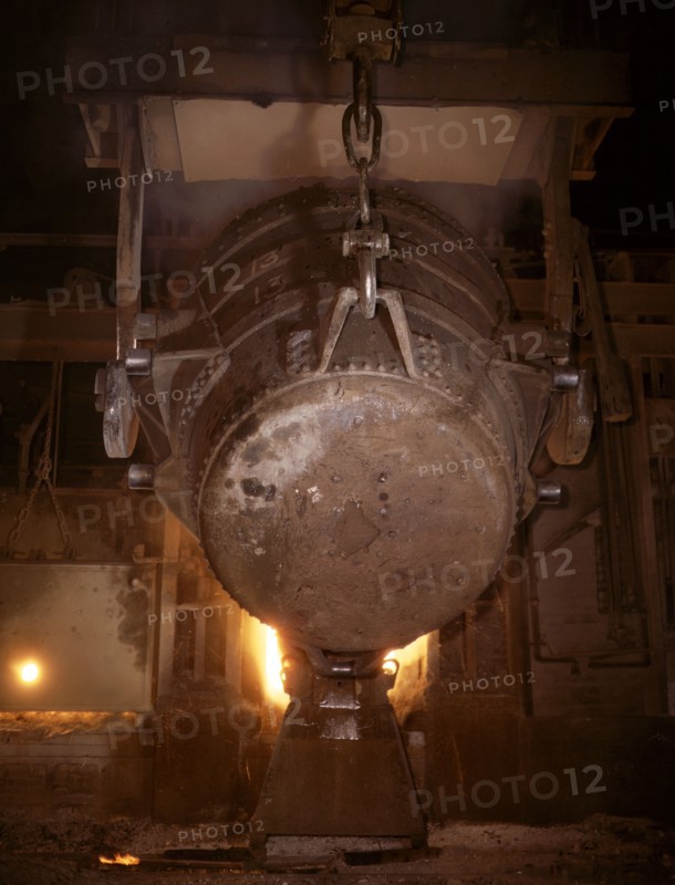 Ladle of molten iron is poured