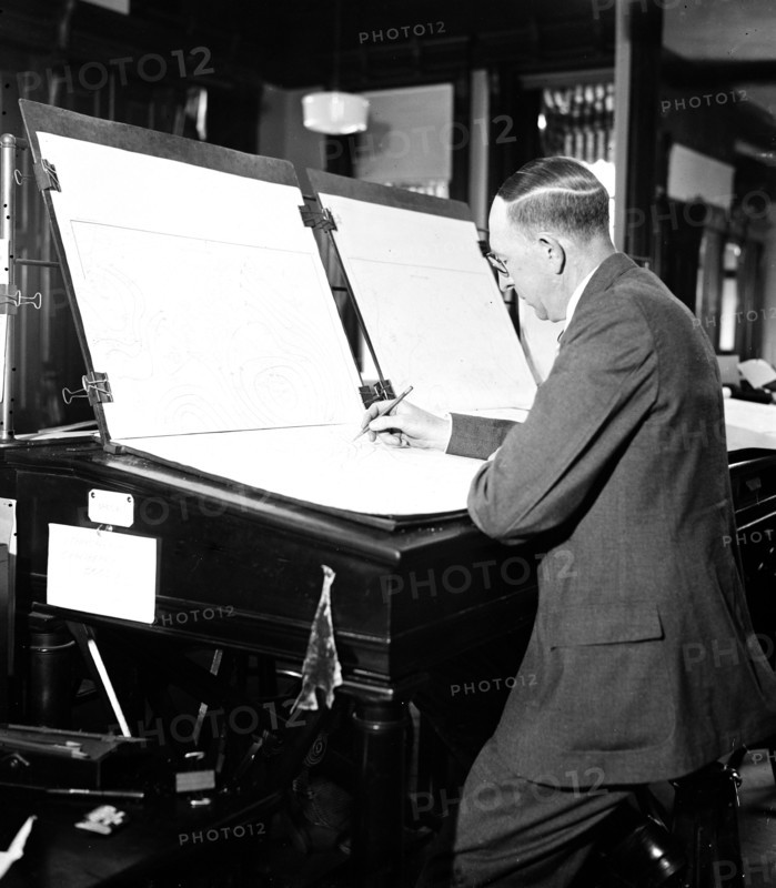 Man creating weather maps