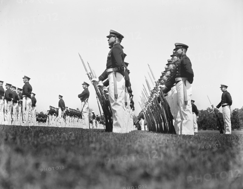 Navy midshipmen drilling