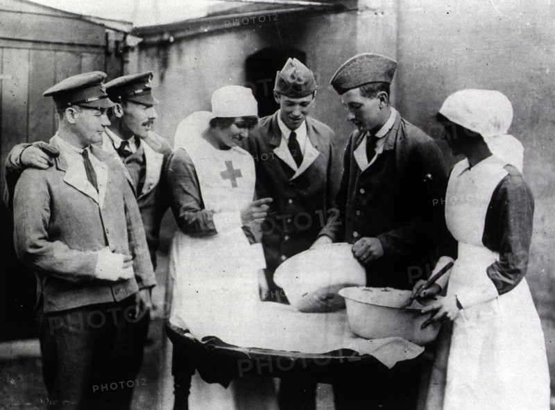 Patients helping nurses in the kitchen s