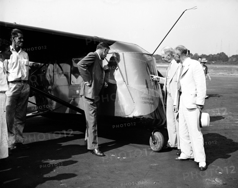 People examining the Waterman Arrowplane