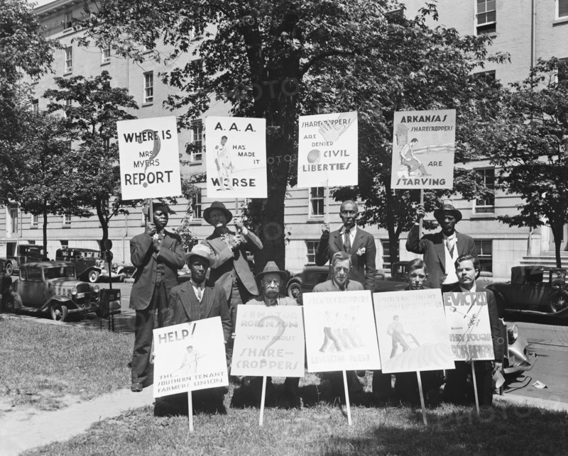 Picketers with signs