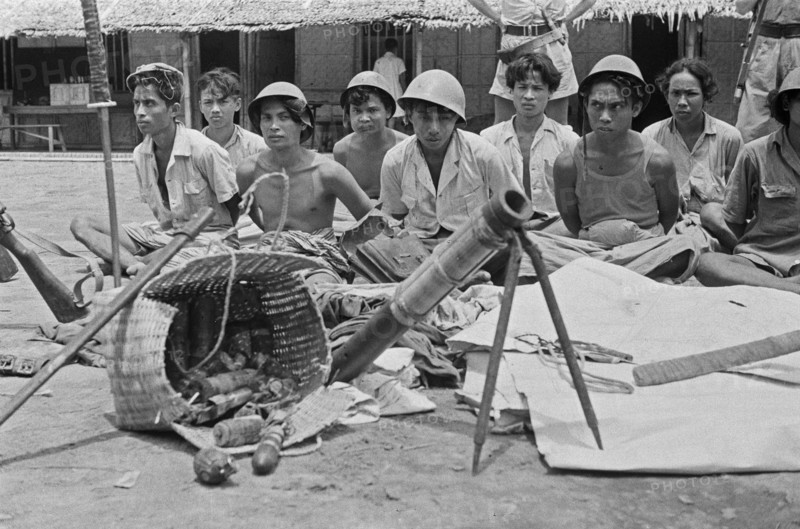 Captured Republican warriors with their weapons; Date 1947; Location Celebes, Indonesia, Dutch East Indies (soldiers in Indonesia)