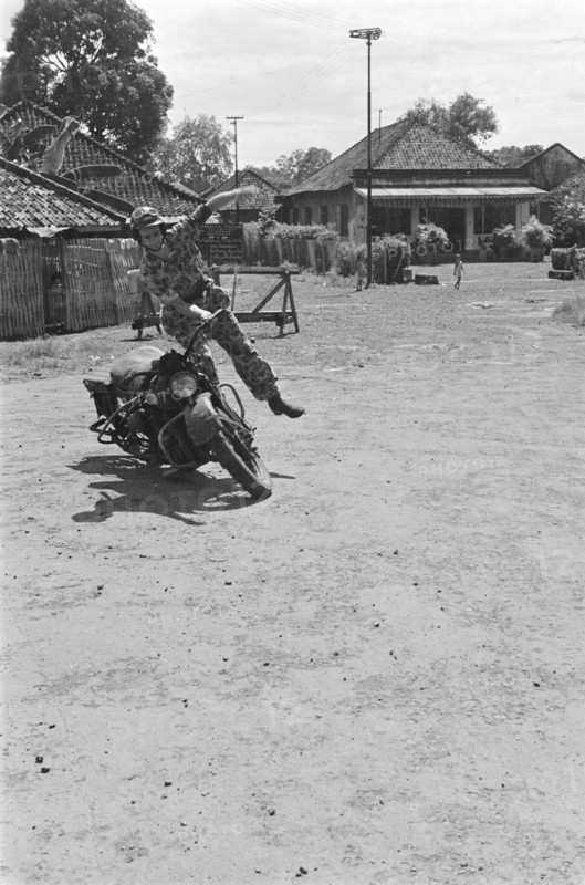 Demonstration skills motorcycle riding in Indonesia, Dutch East Indies ca. 1947