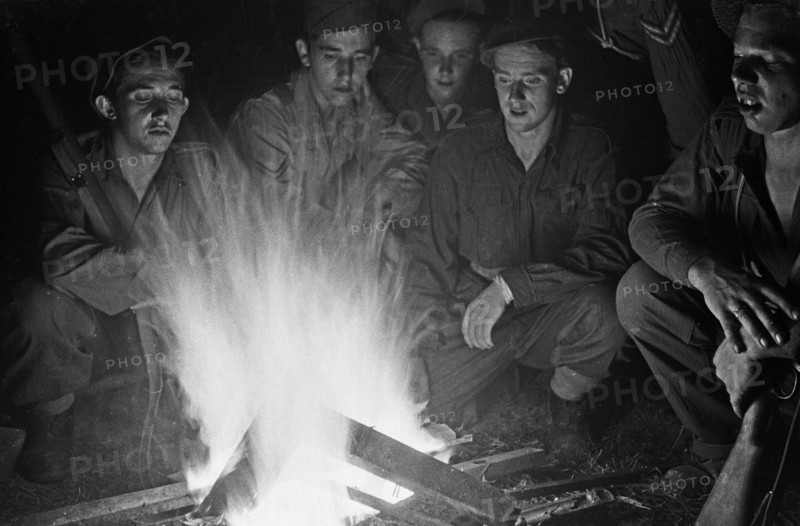 Dutch Soldiers around a campfire in Indonesia, Dutch East Indies ca. 1947