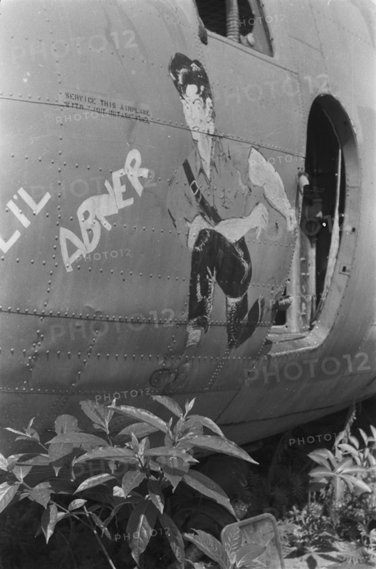 American Aircraft Graveyard, Drawing of muscular man with caption Lil Abner; Date November 10, 1947; Location Indonesia, Dutch East Indies