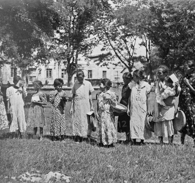 Indonesian Girls seem to have received new clothes; Date February 1947; Location Indonesia, Dutch East Indies