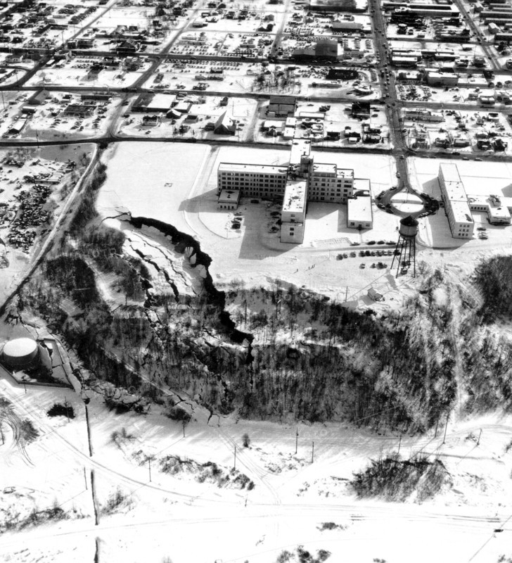 March 27, 1964 Alaska earthquake. The landslide occurred next to this hospital in Anchorage which is showing graben and pressure ridges.