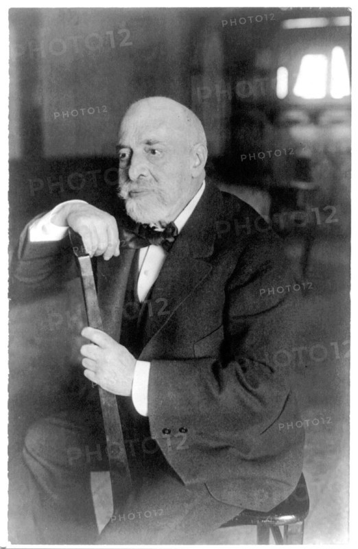 Leopold Auer, 1845-1930, three-quarter length portrait, seated