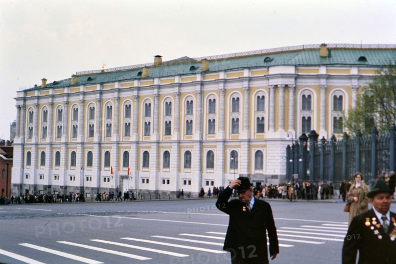 Pedestrians outside of the Armory Museum in Moscow Russia on a cool spring day in late 1970s (1978)