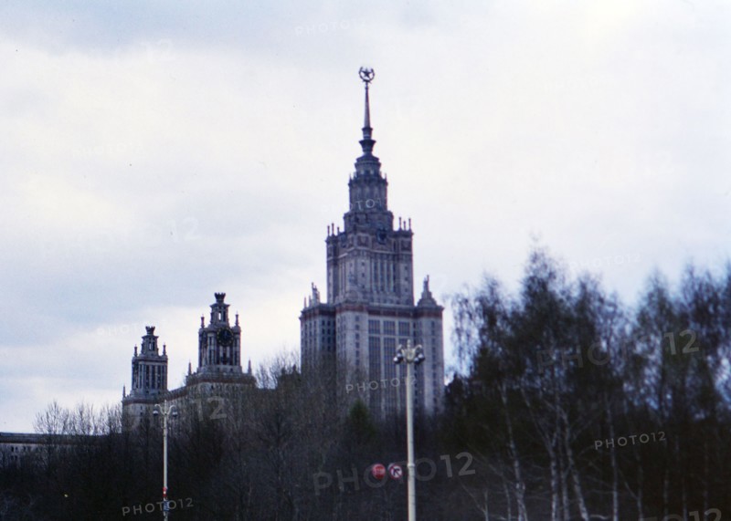 Buildings and architecture in a major city in Russia, communist star on top of building - Moscow State University ca. 1978